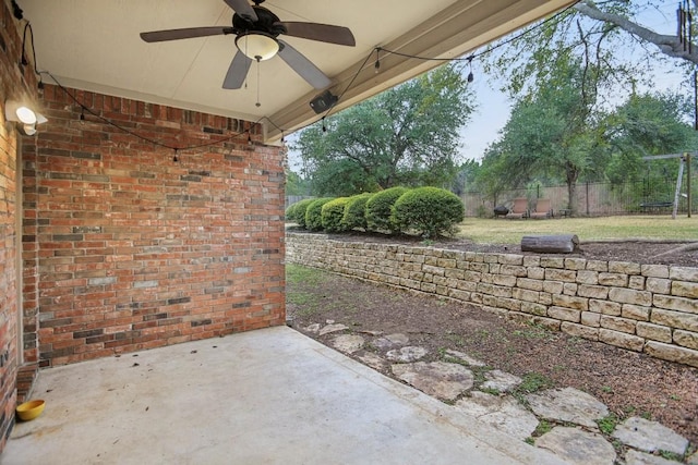 3304 Mulberry Creek Dr, Austin, TX 78732 - fenced backyard with a ceiling fan and a patio