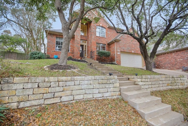 3304 Mulberry Creek Dr, Austin, TX 78732 - traditional-style house featuring brick siding and a garage