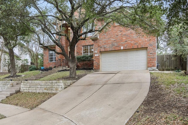 3304 Mulberry Creek Dr, Austin, TX 78732 - view of front of property featuring driveway, brick siding, and stairway