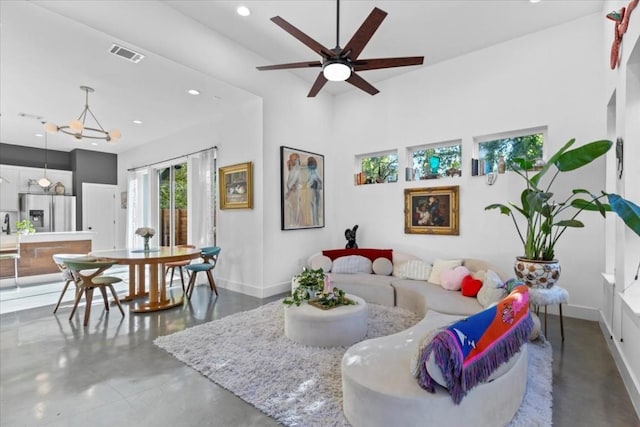 2115 Uphill Ln Unit A, Austin, TX 78741 - living area featuring recessed lighting, ceiling fan, finished concrete flooring, baseboards, and visible vents
