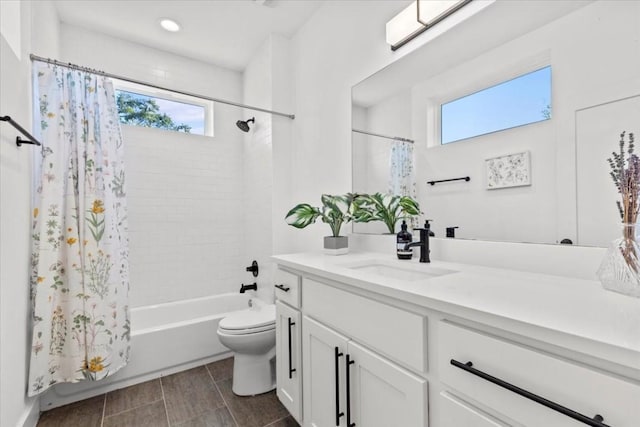2115 Uphill Ln Unit A, Austin, TX 78741 - bathroom with vanity, plenty of natural light, shower / tub combo with curtain, toilet, and recessed lighting