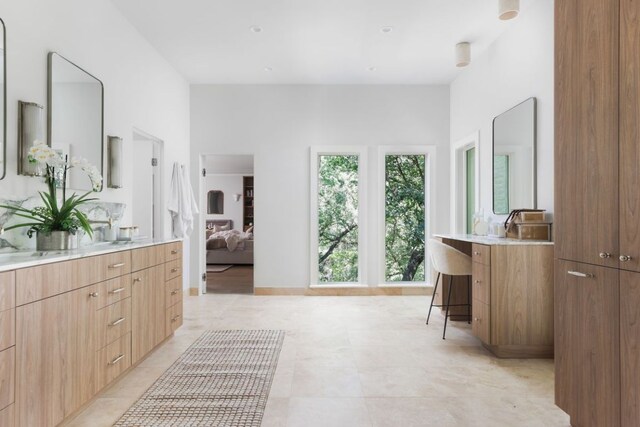 3614 Murillo Cir, Austin, TX 78703 - bathroom with vanity, connected bathroom, and tile patterned flooring