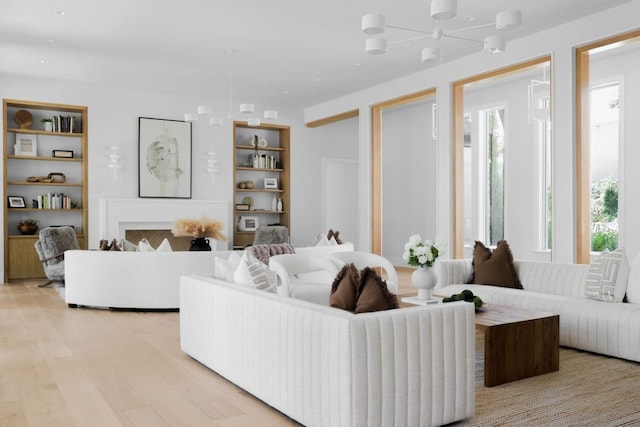 3614 Murillo Cir, Austin, TX 78703 - living room with light wood finished floors and built in features