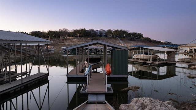 view of dock with a water view and boat lift