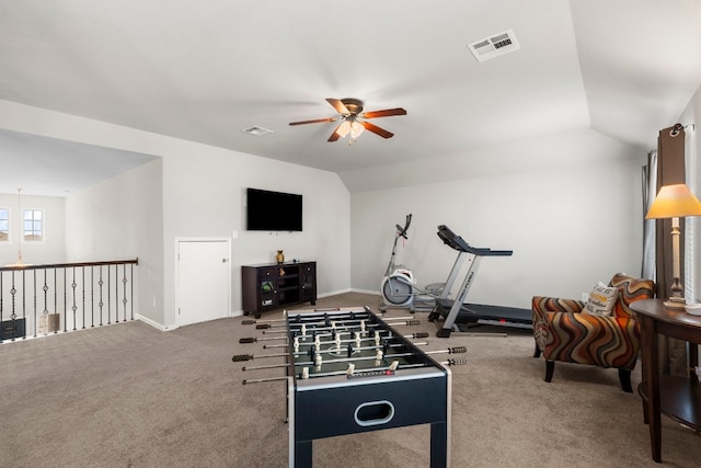 recreation room with a ceiling fan, lofted ceiling, baseboards, visible vents, and carpet floors