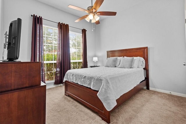 19900 Kite Wing Ter, Pflugerville, TX 78660 - bedroom featuring light carpet, a ceiling fan, and baseboards