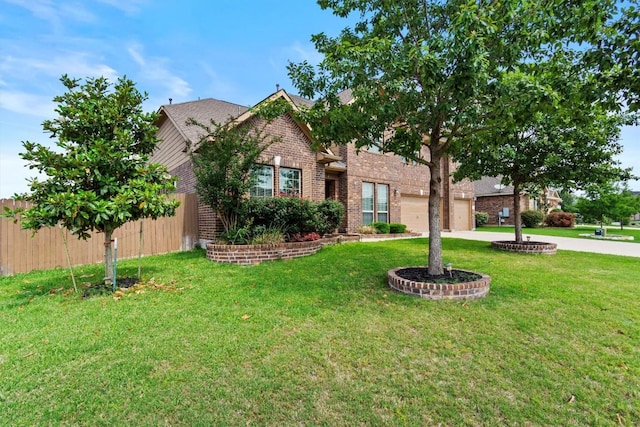 19900 Kite Wing Ter, Pflugerville, TX 78660 - view of front of home with brick siding, concrete driveway, and an attached garage