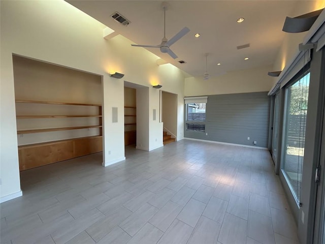 spare room with ceiling fan, recessed lighting, visible vents, baseboards, and stairway