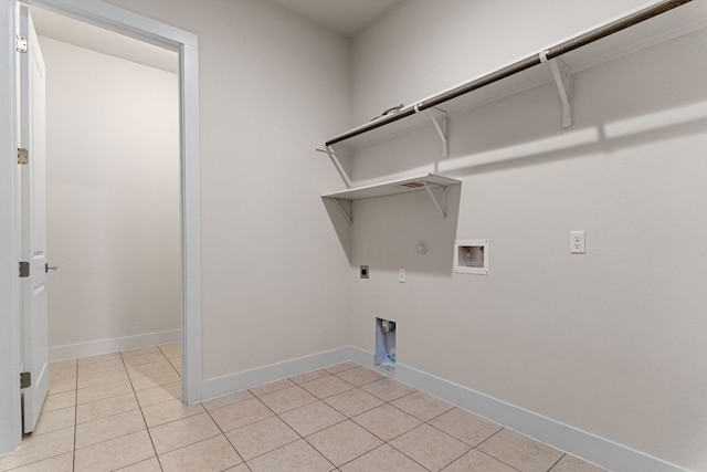 laundry room with light tile patterned floors, hookup for a gas dryer, laundry area, washer hookup, and electric dryer hookup