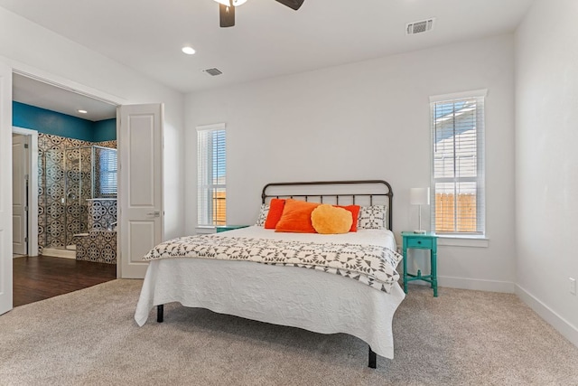 carpeted bedroom featuring baseboards, visible vents, ceiling fan, and recessed lighting