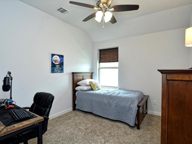 bedroom featuring light carpet, baseboards, visible vents, and lofted ceiling