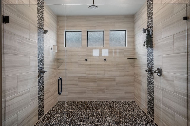 full bathroom featuring a shower stall