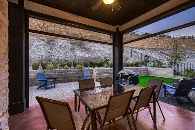 219 Baldovino Skwy, Lakeway, TX 78738 - fenced backyard featuring ceiling fan, outdoor dining area, a patio area, and grilling area
