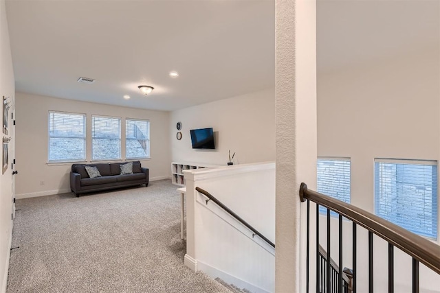 219 Baldovino Skwy, Lakeway, TX 78738 - carpeted living room with baseboards and recessed lighting