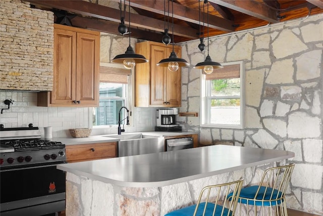 19745 Lakehurst Loop, Spicewood, TX 78669 - kitchen with stainless steel appliances, a sink, light countertops, decorative backsplash, and beamed ceiling