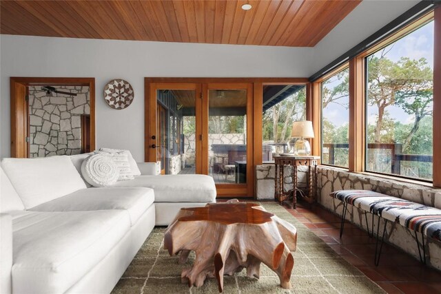 19745 Lakehurst Loop, Spicewood, TX 78669 - living room with tile patterned floors and wood ceiling