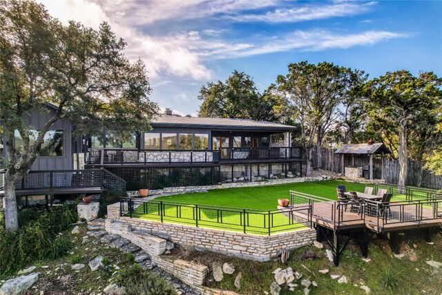 19745 Lakehurst Loop, Spicewood, TX 78669 - back of property featuring a deck and stairway