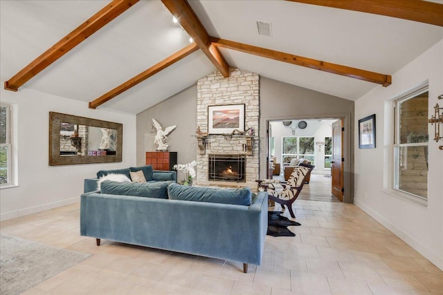 1920 River Rd, Wimberley, TX 78676 - living room featuring a fireplace, baseboards, and light tile patterned floors
