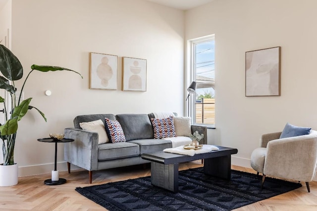 living room featuring baseboards