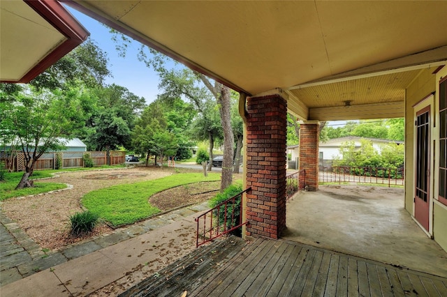 view of patio featuring fence