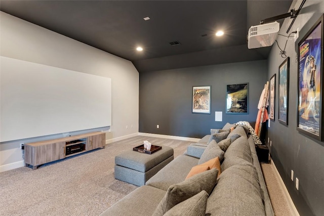 cinema room featuring light carpet, baseboards, visible vents, and recessed lighting