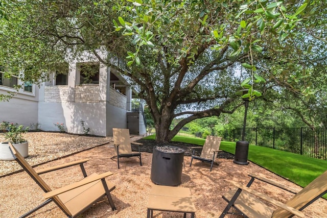 view of patio / terrace featuring fence