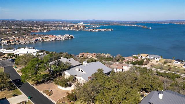 bird's eye view with a residential view and a water view