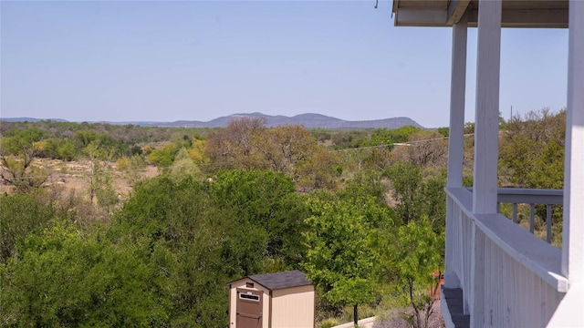 911 Sandy Mountain Dr, Sunrise Beach, TX 78643 - view of mountain backdrop featuring a forest