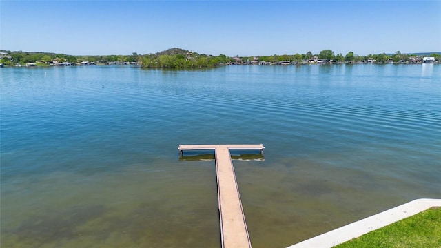 911 Sandy Mountain Dr, Sunrise Beach, TX 78643 - water view with a dock