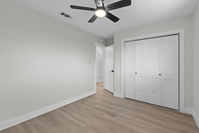 10505 Parkfield Dr, Austin, TX 78758 - unfurnished bedroom with light wood-style flooring, baseboards, visible vents, a closet, and ceiling fan