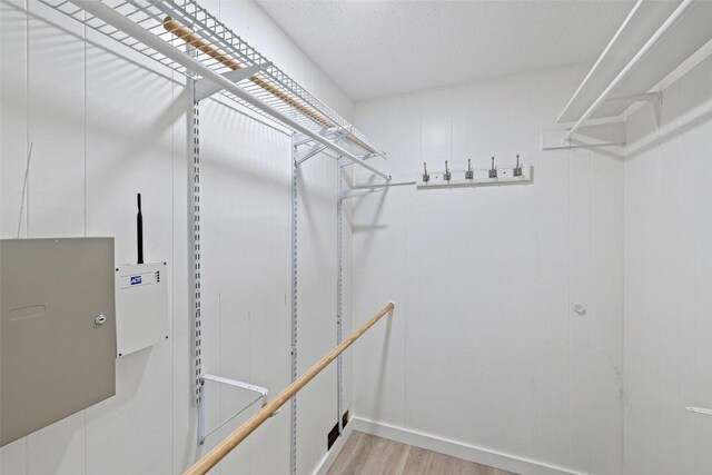 1201 Lake Shore Dr, Spicewood, TX 78669 - walk in closet featuring light wood-type flooring