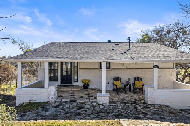1201 Lake Shore Dr, Spicewood, TX 78669 - rear view of property with roof with shingles