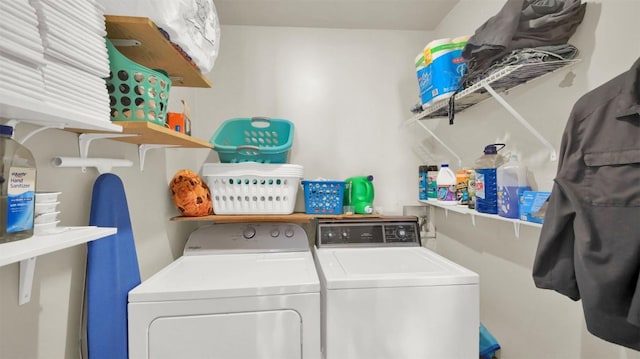 laundry room featuring laundry area and washing machine and dryer