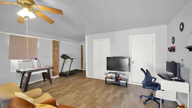 office featuring ceiling fan, cooling unit, and wood finished floors