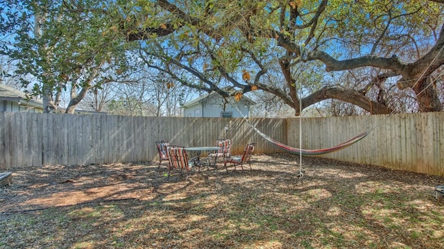 view of yard featuring a fenced backyard