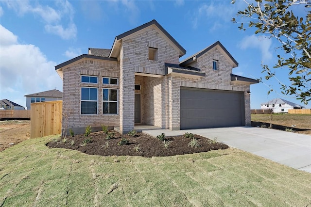 2705 Sage Ranch Dr Unit 6, Leander, TX 78641 - view of front of home featuring brick siding, driveway, and a garage
