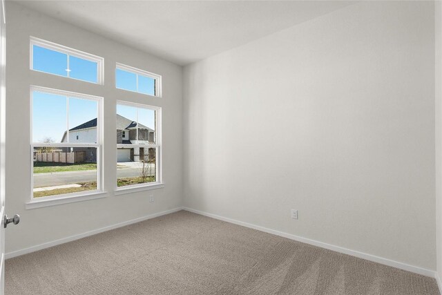 2705 Sage Ranch Dr Unit 6, Leander, TX 78641 - spare room with carpet and baseboards