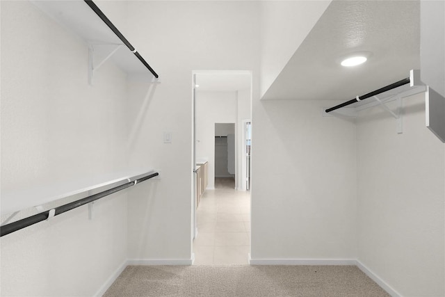 2705 Sage Ranch Dr Unit 6, Leander, TX 78641 - walk in closet featuring light carpet and light tile patterned floors