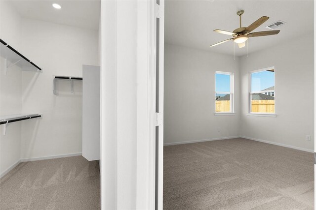 2705 Sage Ranch Dr Unit 6, Leander, TX 78641 - walk in closet featuring carpet and a ceiling fan