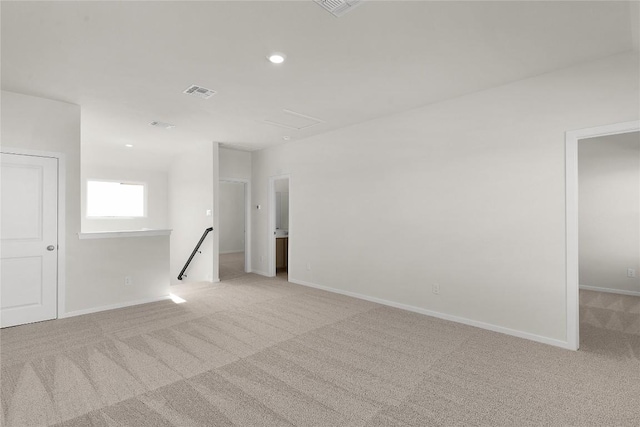 2705 Sage Ranch Dr Unit 6, Leander, TX 78641 - unfurnished room featuring light carpet, baseboards, attic access, and recessed lighting