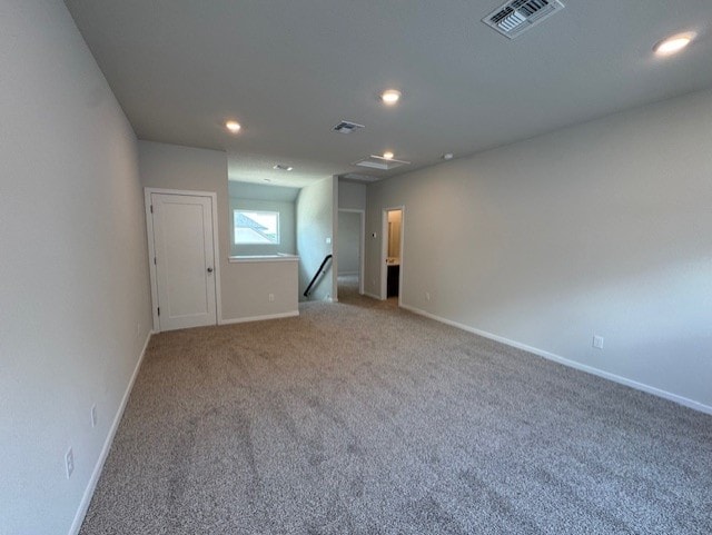 2705 Sage Ranch Dr Unit 6, Leander, TX 78641 - carpeted empty room featuring baseboards and recessed lighting