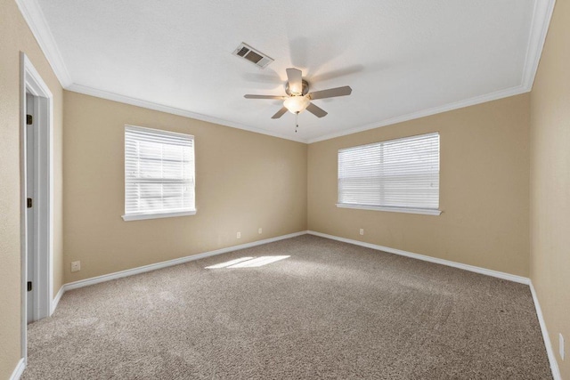 1206 Hi Stirrup Unit 311, Horseshoe Bay, TX 78657 - unfurnished room featuring ornamental molding, ceiling fan, carpet, and plenty of natural light