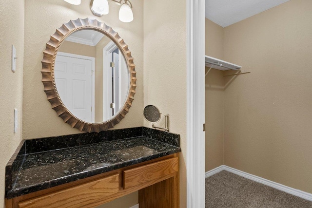 1206 Hi Stirrup Unit 311, Horseshoe Bay, TX 78657 - bathroom featuring vanity and baseboards