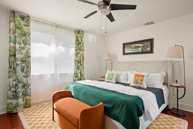 1201 Taylor St, Austin, TX 78702 - bedroom with wood finished floors, ceiling fan, and baseboards