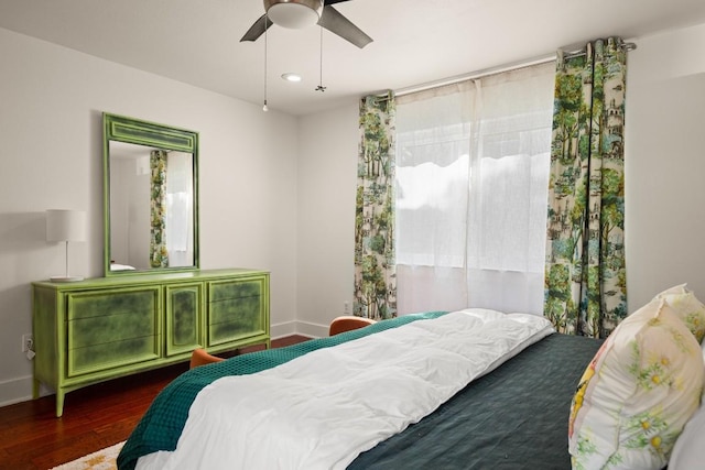 1201 Taylor St, Austin, TX 78702 - bedroom featuring wood finished floors, baseboards, and ceiling fan