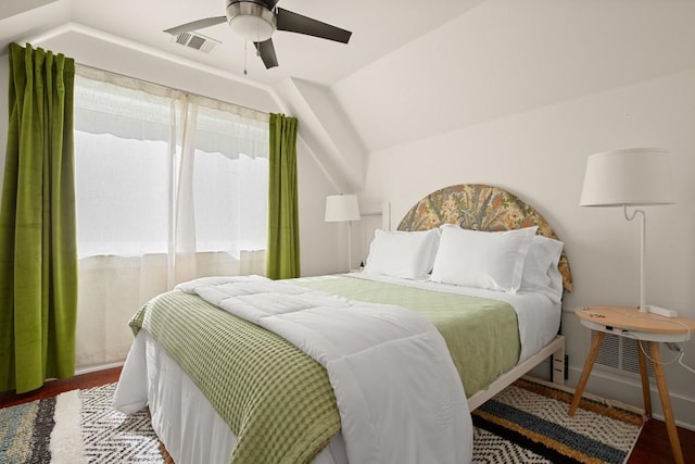 1201 Taylor St, Austin, TX 78702 - bedroom featuring wood finished floors, vaulted ceiling, and ceiling fan