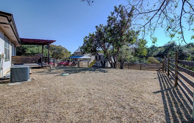 view of yard featuring a fenced backyard and cooling unit