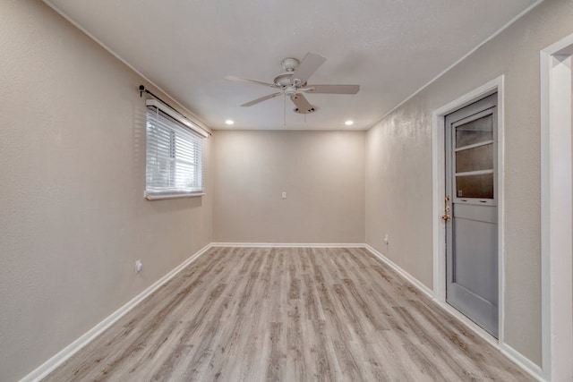 unfurnished room featuring ceiling fan, recessed lighting, light wood-type flooring, and baseboards