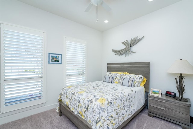 carpeted bedroom featuring a ceiling fan and recessed lighting