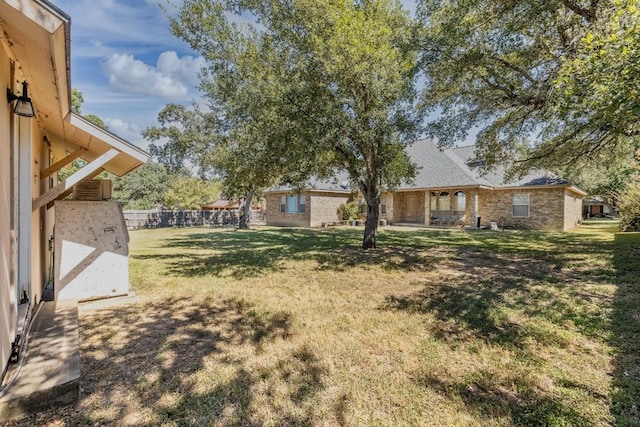 view of yard featuring fence